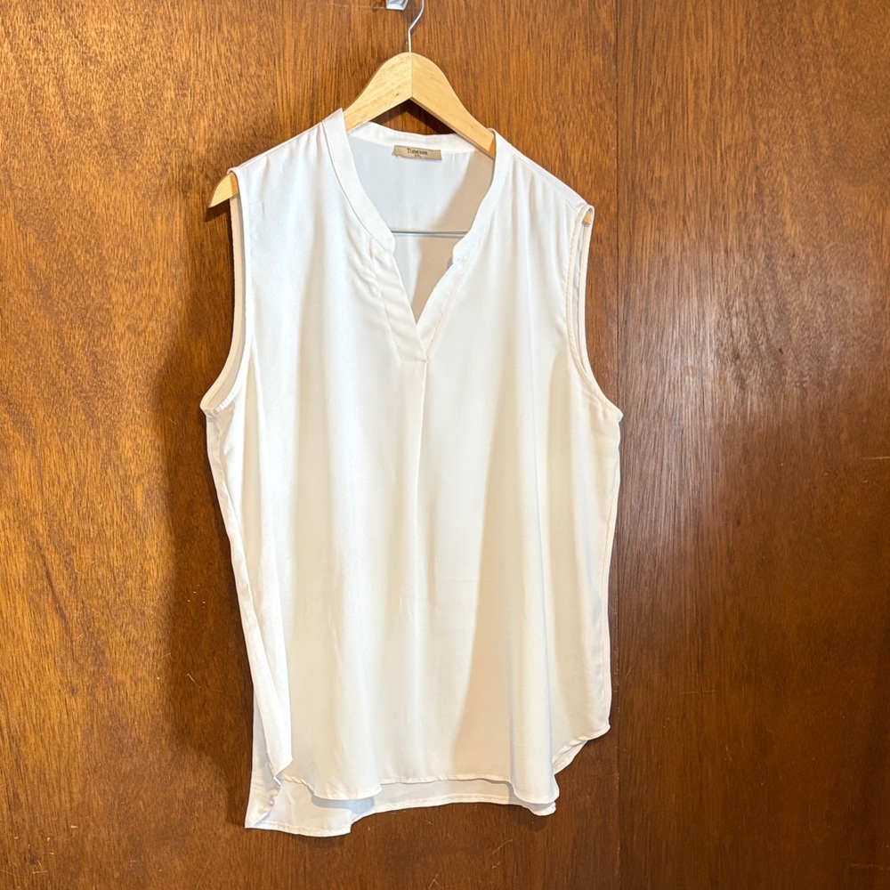 Chic Ivory Sleeveless Blouse